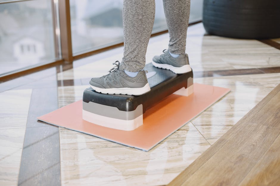 Person stepping onto Renpho scale in bright modern home gym setting