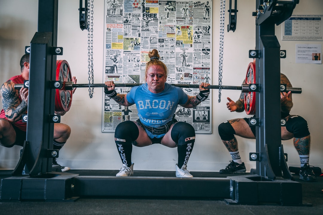 Strong app progress charts showing barbell squat one rep max improvement over time