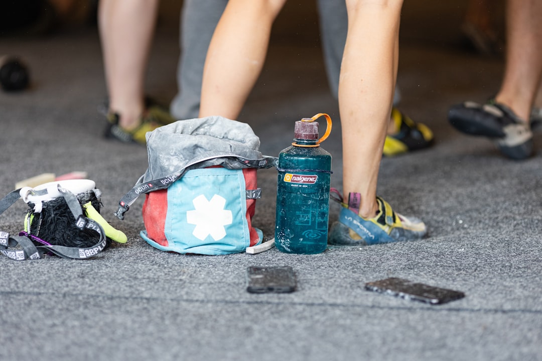 TouchPoint device next to gym bag and water bottle showing athletic lifestyle use