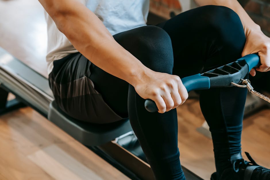athlete using Marpo Kinetic Rower Pro intense workout gym