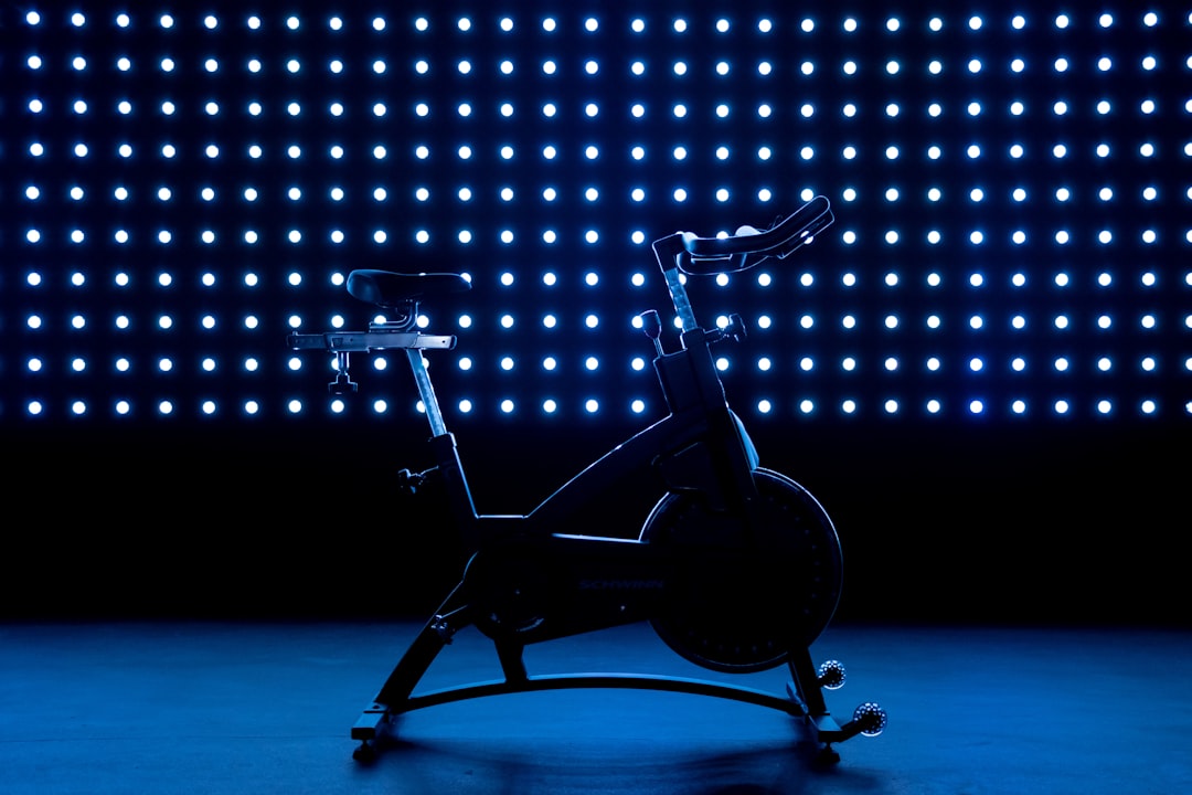 close-up Peloton Bike+ rotating touchscreen display showing fitness class