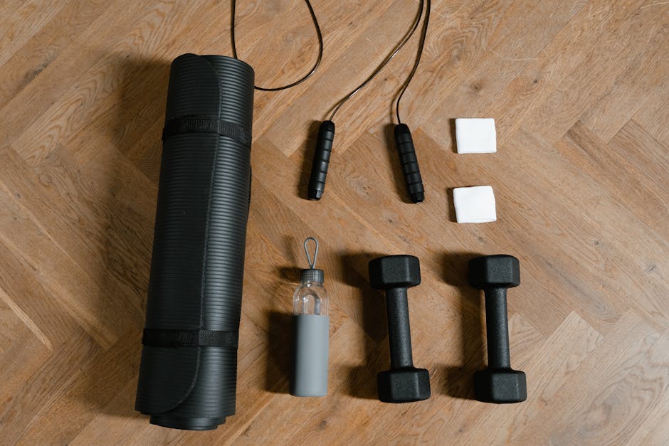 close-up of Wahoo Tickr pod and strap flat lay on gym floor