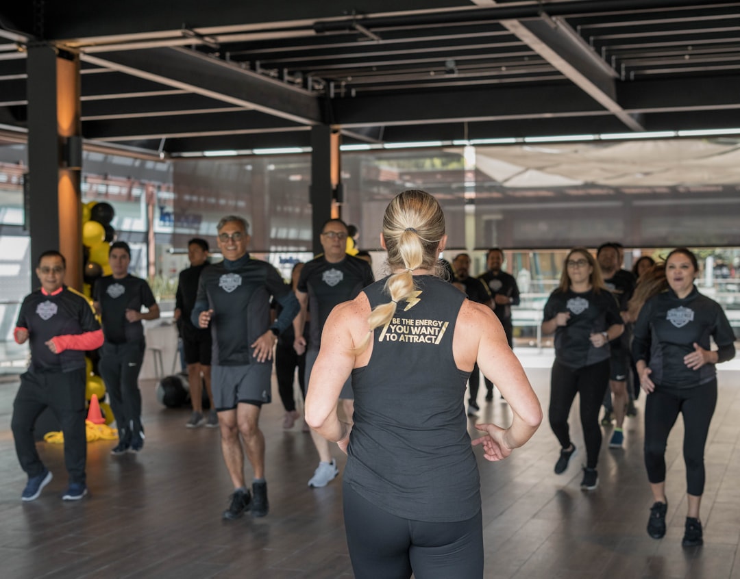 group fitness class participants wearing heart rate monitors