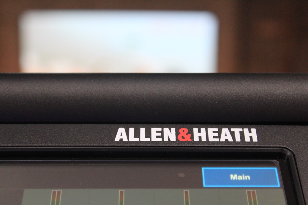 performance monitor display on rowing machine showing split time and watts