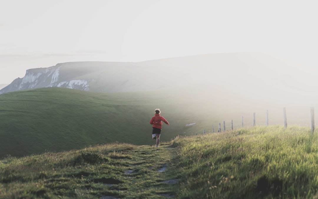 Runner using Strava GPS tracking on an outdoor run