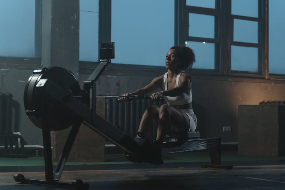Stamina Air Rower folded upright for storage in small room