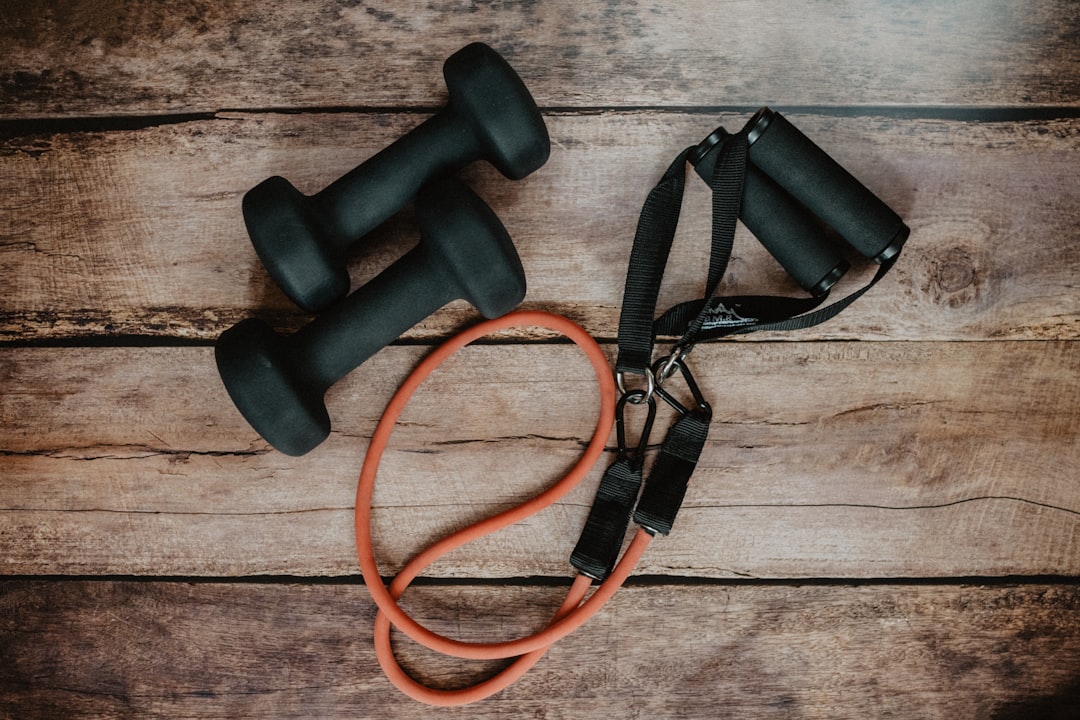 Home gym strength training with adjustable dumbbells