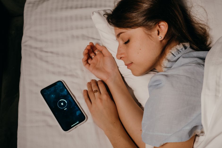 Whoop Band Gen 6 app dashboard showing HRV recovery score and sleep stages on smartphone