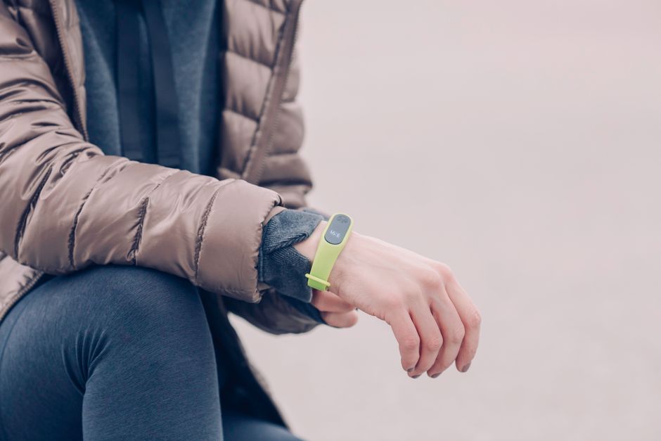 Whoop Band Gen 6 wrist wearable fitness tracker on athlete's wrist during workout