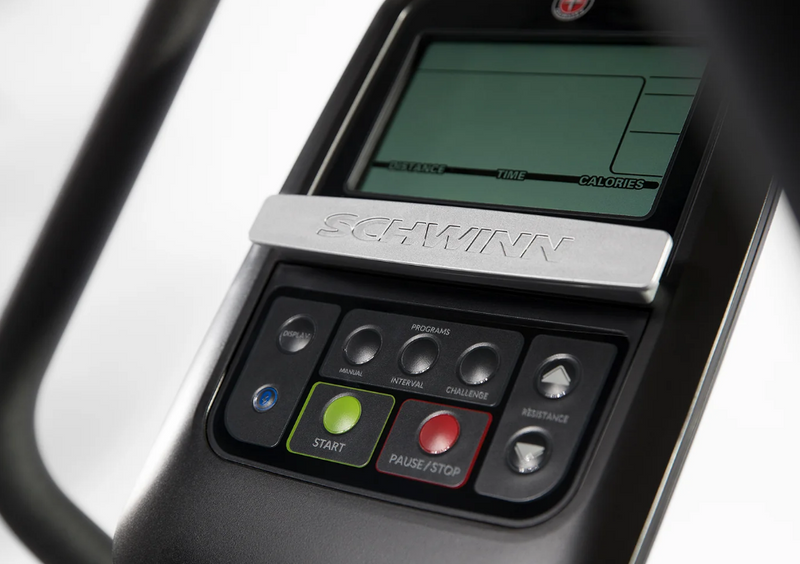 Schwinn 510E 5.5 inch LCD console showing distance, time and calories, with start, pause and resistance buttons
