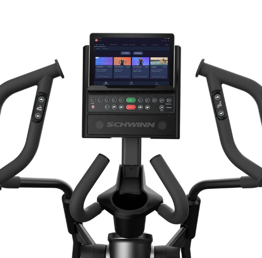 Schwinn 590E 7 inch colour console with app tiles and incline control buttons on the handlebars